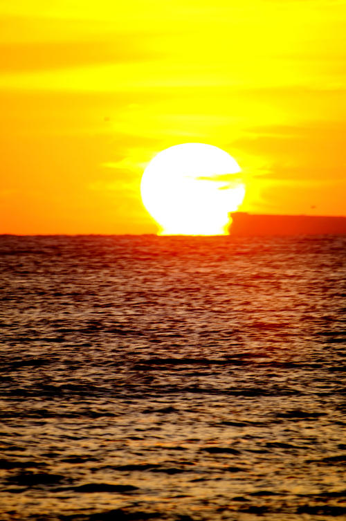 一句话描述海上日出